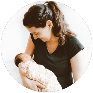 new mom holding her newborn baby
