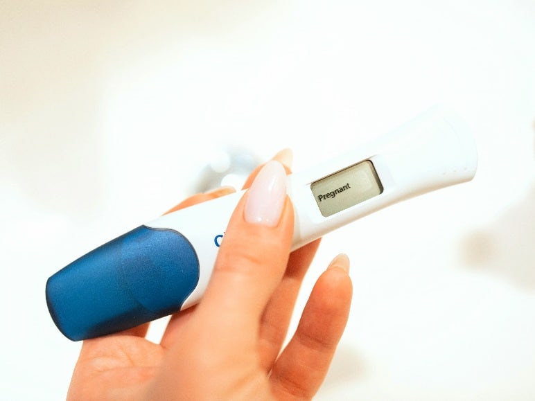 pregnancy test with digital result on display