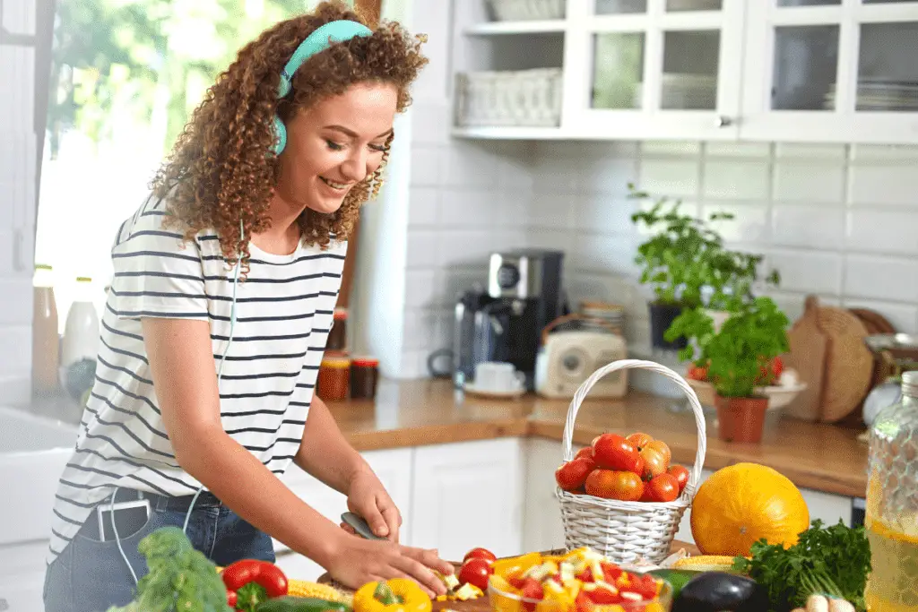 new mom cooking whilst listening to an audiobook