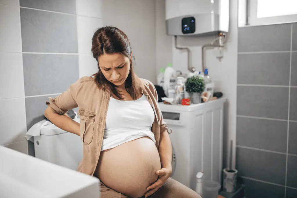 pregnant woman experiencing soft signs of labor being 24-48 hours away